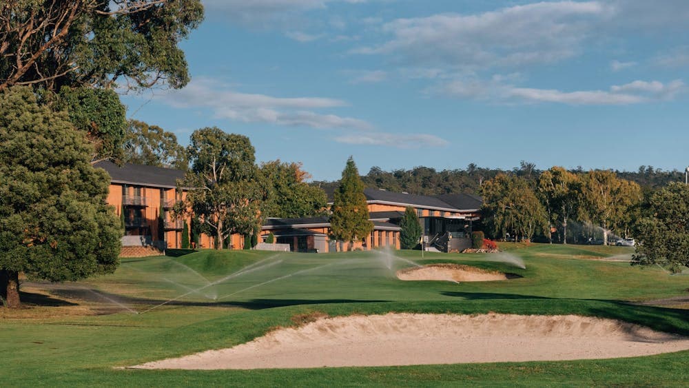 Golf course with Country Club Resort in background
