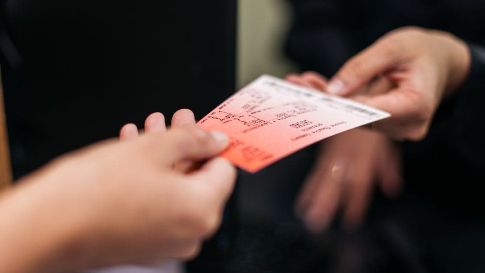 Handing over of theatre tickets