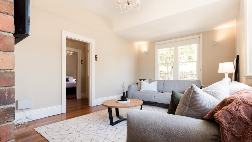 Lounge room with television at Gorgeous on Galvin holiday home