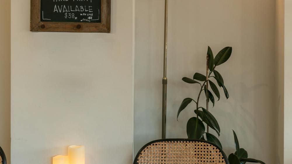 Intimate seat and table with mood lighting in the Wine Room