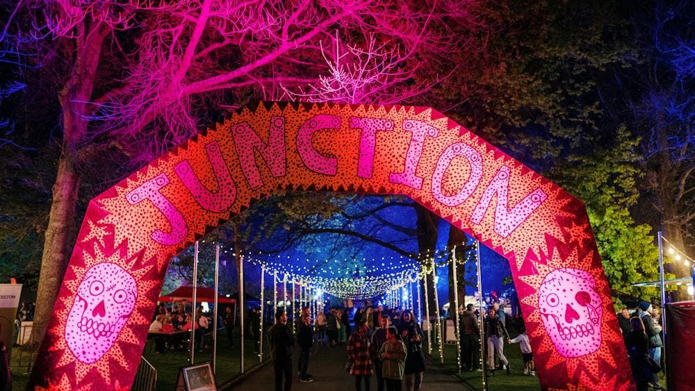 Lit archway that has "Junction" written on it