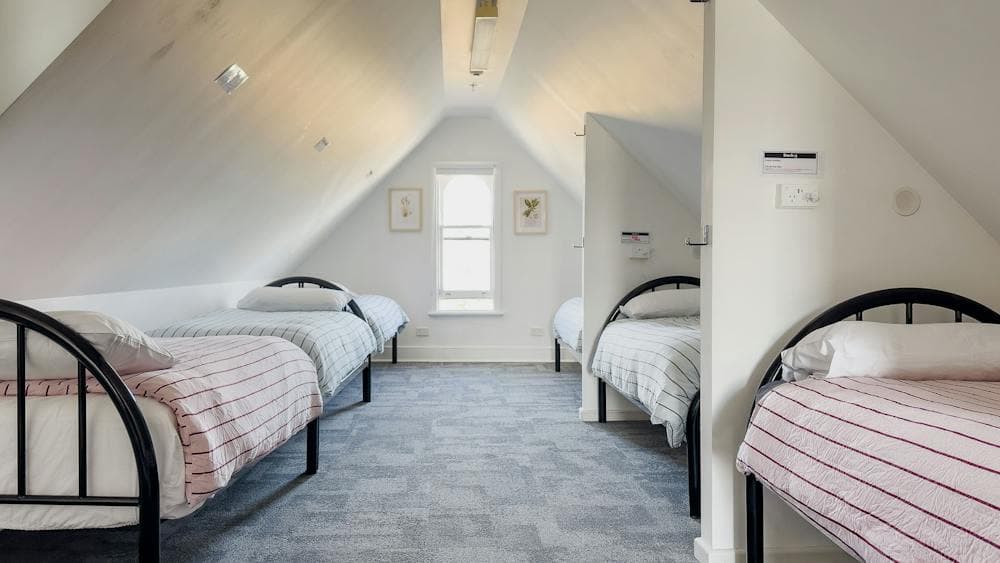 Single bed dorm room for females